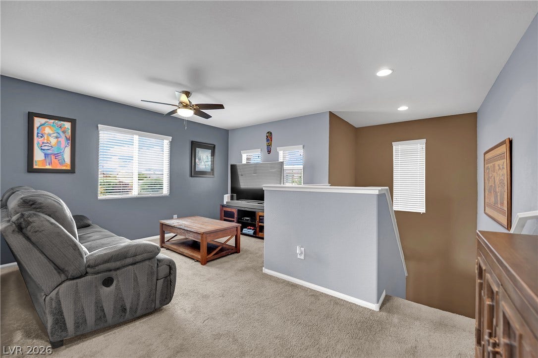 1421 Lamance Court, North Las Vegas, NV 89031 Smooth carpeting pairs with recessed lighting in this versatile upper-level living space.
