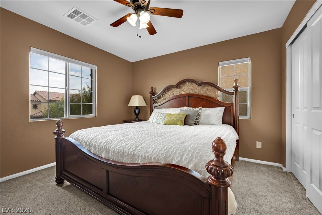 1421 Lamance Court, North Las Vegas, NV 89031 Plush carpeting and dual windows enhance this comfortable and inviting sleeping space.