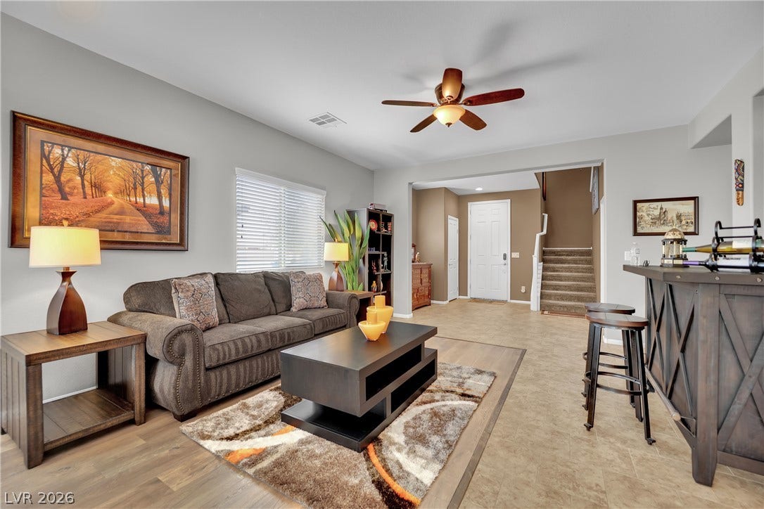 1421 Lamance Court, North Las Vegas, NV 89031 An open floorplan seamlessly connects the comfortable living spaces and adjacent entryway.