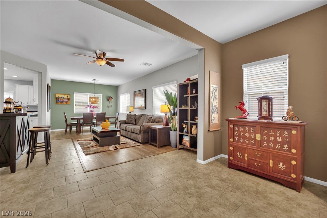 1421 Lamance Court, North Las Vegas, NV 89031 An open floor plan seamlessly connects the tiled entry area to the main living spaces.
