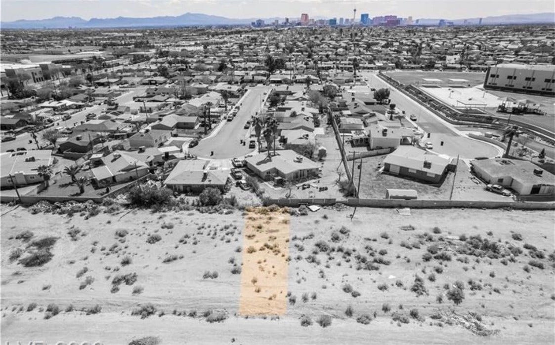 Commerce And Windsor, North Las Vegas, NV 89030 An aerial perspective captures the neighborhood landscape set against a distant city skyline.