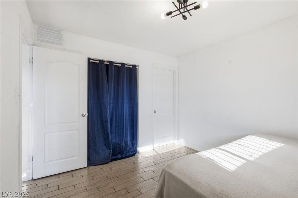 3726 Hazelwood Street, #14, Las Vegas, NV 89119 Clean lines and wood-look ceramic tile flooring with a functional closet and an ensuite bathroom.