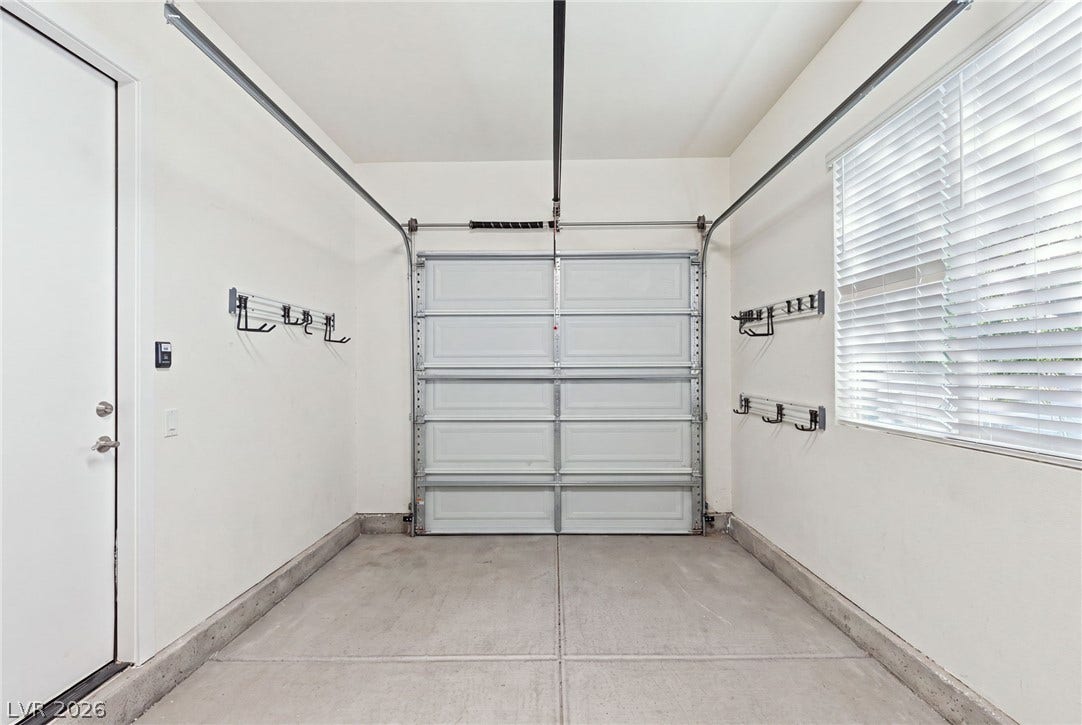 A well-maintained garage offers ample storage and direct home access, ensuring convenience and utility.