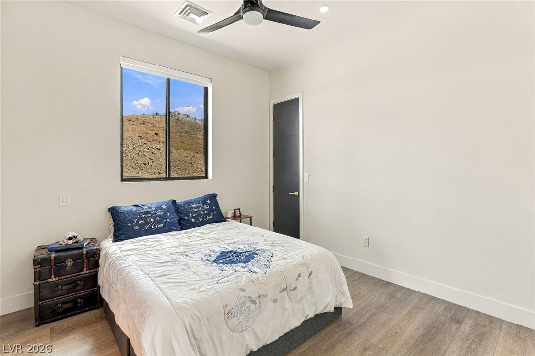 324 Wanda Road, Henderson, NV 89002 Smooth wood floors and tall ceilings anchor this quiet personal retreat.