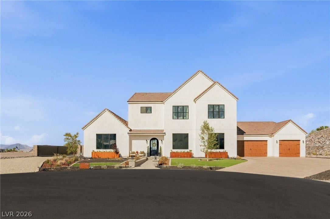 324 Wanda Road, Henderson, NV 89002 Striking contemporary lines and manicured landscaping define this elegant multi-level exterior design.