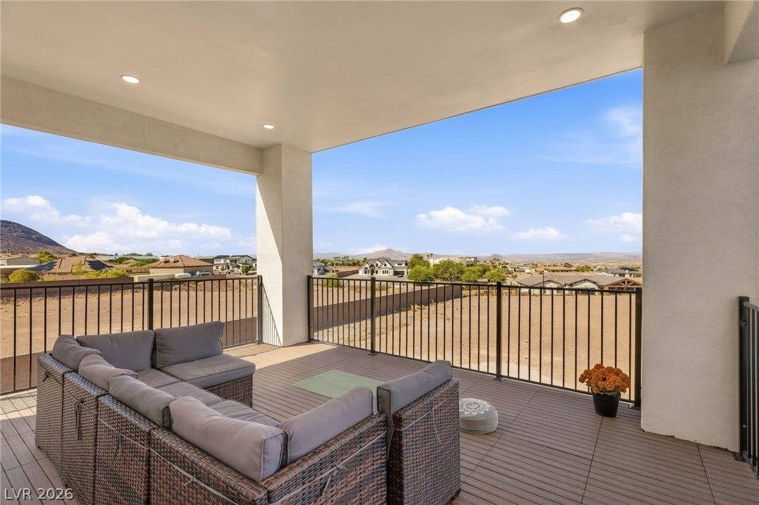 324 Wanda Road, Henderson, NV 89002 A spacious covered deck provides sweeping neighborhood and distant mountain views.