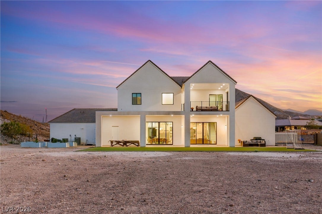 324 Wanda Road, Henderson, NV 89002 Clean architectural lines define this modern two-story home set against a desert mountain backdrop.