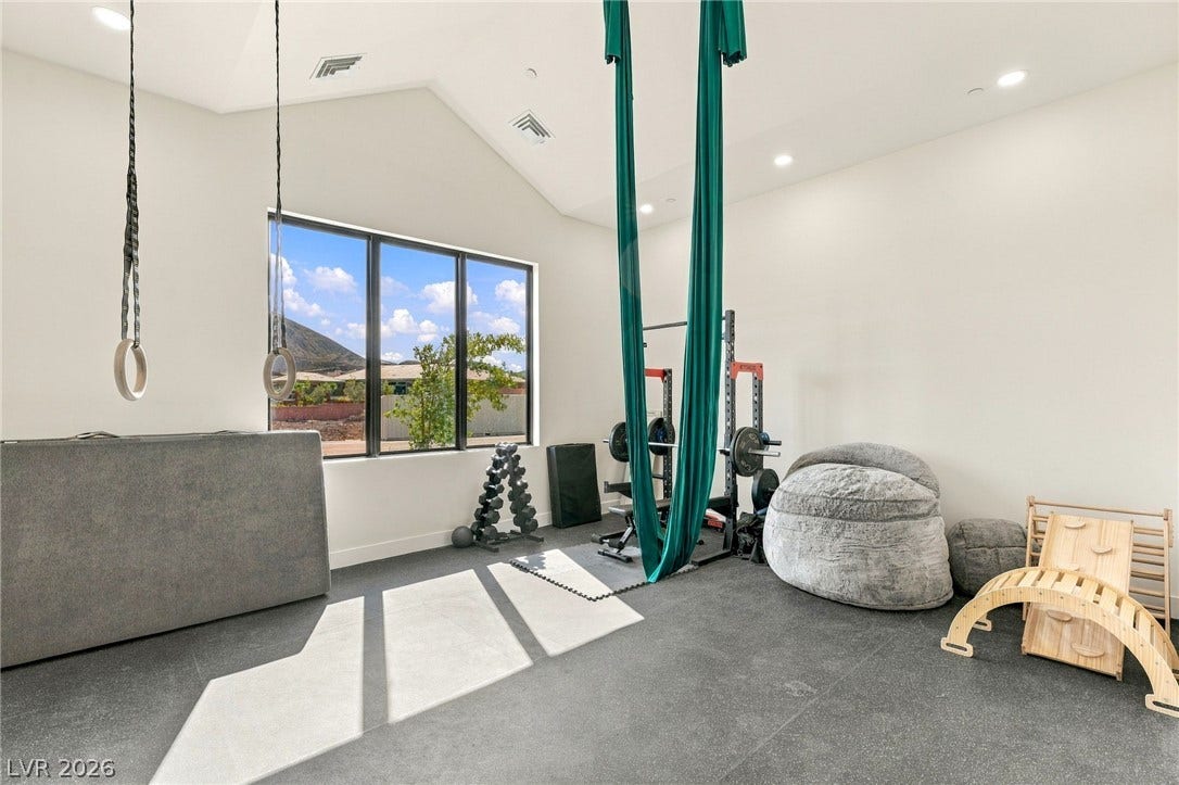 324 Wanda Road, Henderson, NV 89002 Vaulted ceilings and expansive windows elevate this versatile exercise space.
