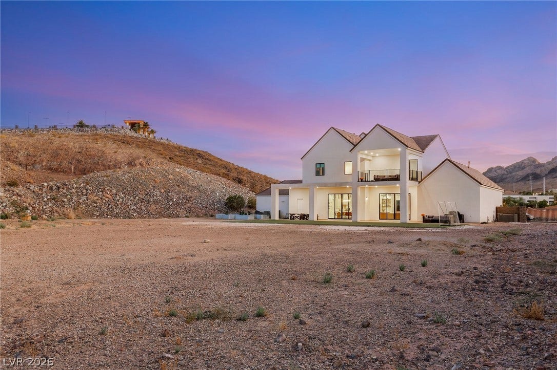 324 Wanda Road, Henderson, NV 89002 An expansive desert lot frames the rear facade of this multi-level contemporary estate.
