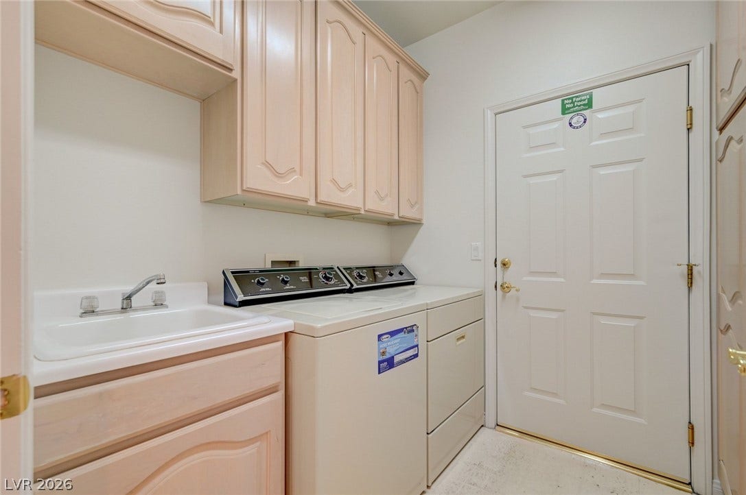 1112 Boletus Drive, Henderson, NV 89011 Ample cabinetry and a convenient utility sink maximize utility in this functional laundry space.