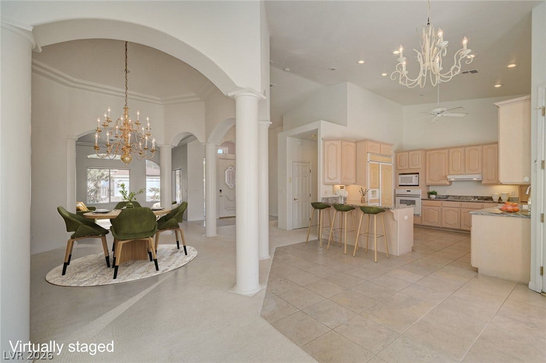 1112 Boletus Drive, Henderson, NV 89011 Graceful archways and soaring ceilings define this elegant open-concept layout.