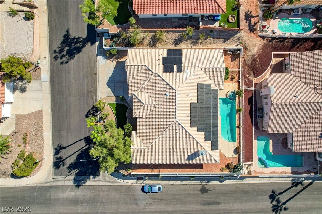 1112 Boletus Drive, Henderson, NV 89011 An aerial perspective showcases the tiled roof equipped with integrated solar panels.