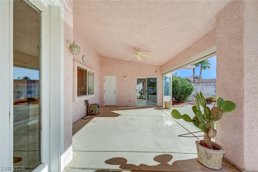1112 Boletus Drive, Henderson, NV 89011 An inviting covered patio features durable concrete flooring and textured stucco columns.