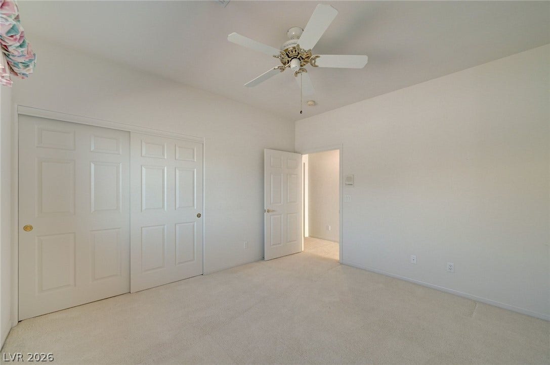 1112 Boletus Drive, Henderson, NV 89011 Plush wall-to-wall carpeting and clean neutral walls define this versatile bedroom space.