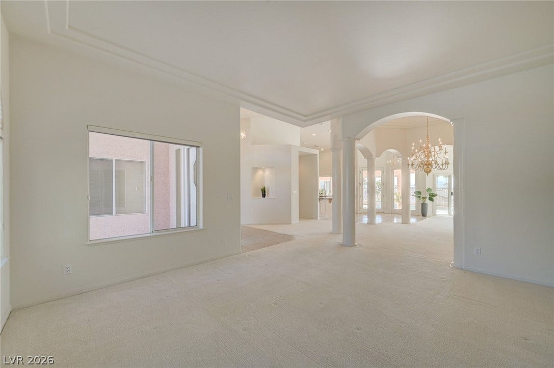 1112 Boletus Drive, Henderson, NV 89011 Classical columns and elegant arched openings define this graceful, open living area.