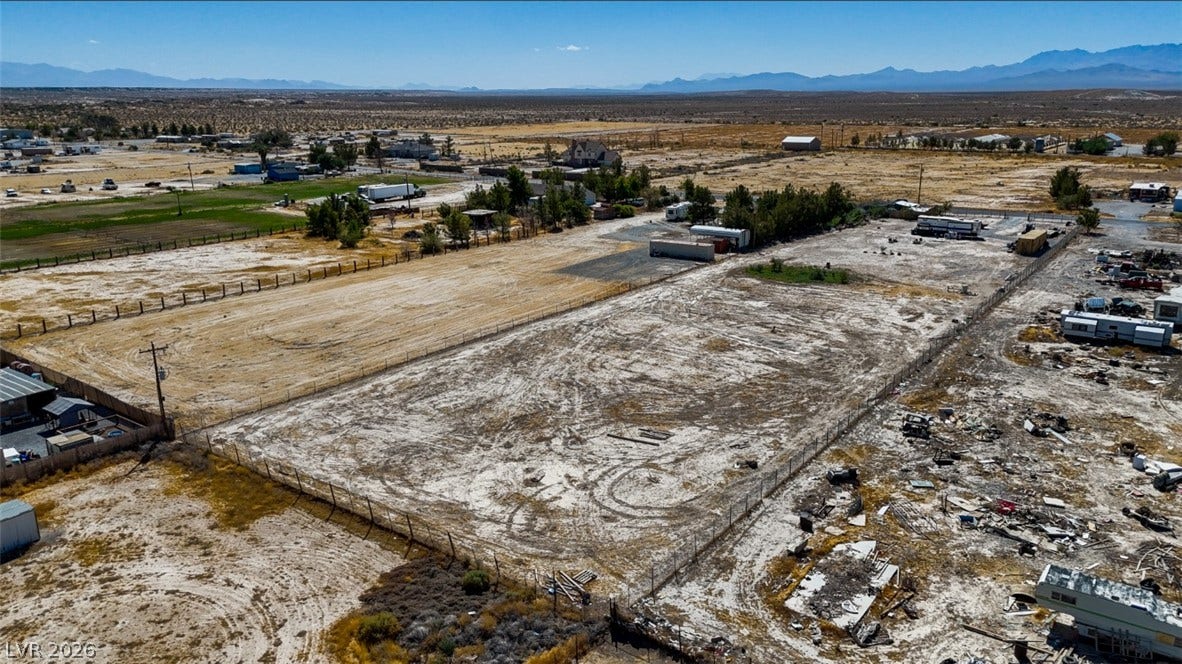 3160 Wall Street, Pahrump, NV 89061 A spacious desert acreage offers dramatic mountain views and vast open terrain.