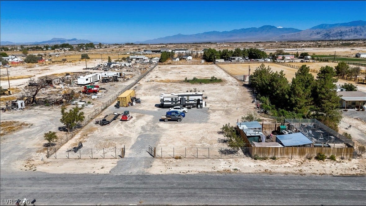 3160 Wall Street, Pahrump, NV 89061 Sweeping mountain horizons frame this vast level parcel offering endless development potential.