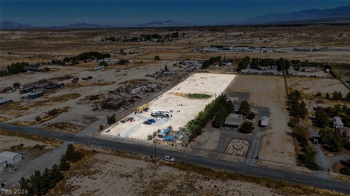 3160 Wall Street, Pahrump, NV 89061 A spacious desert parcel yields endless potential against a backdrop of distant mountain ranges.