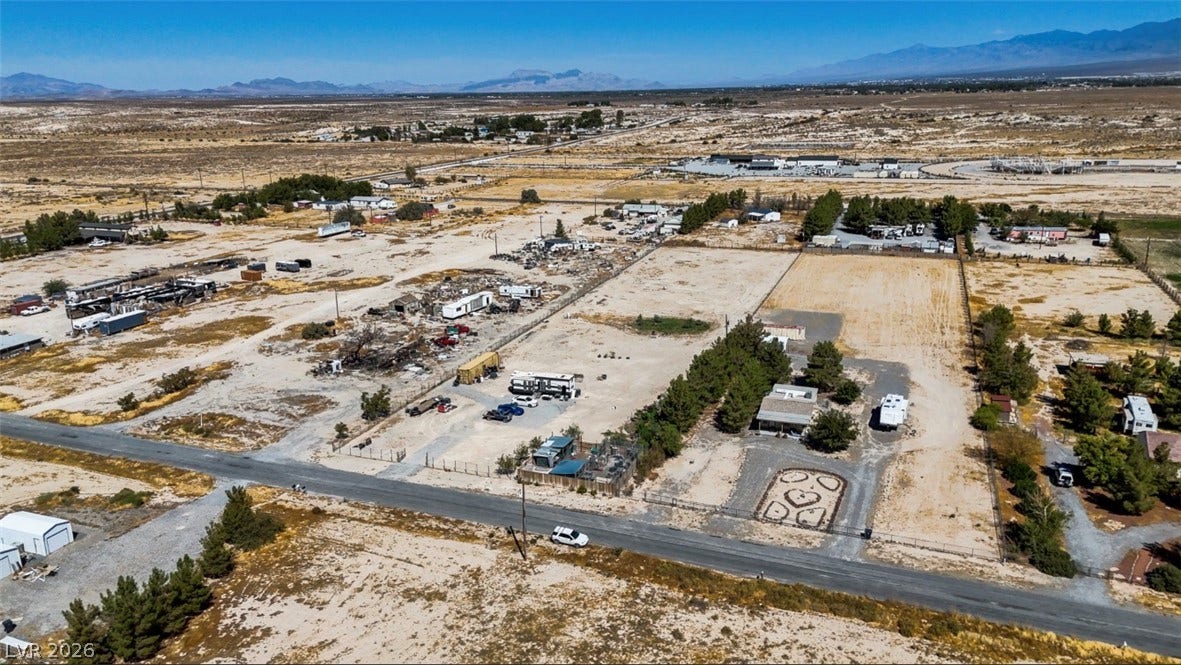 3160 Wall Street, Pahrump, NV 89061 A vast desert landscape stretches out toward majestic mountain ranges in the distance.