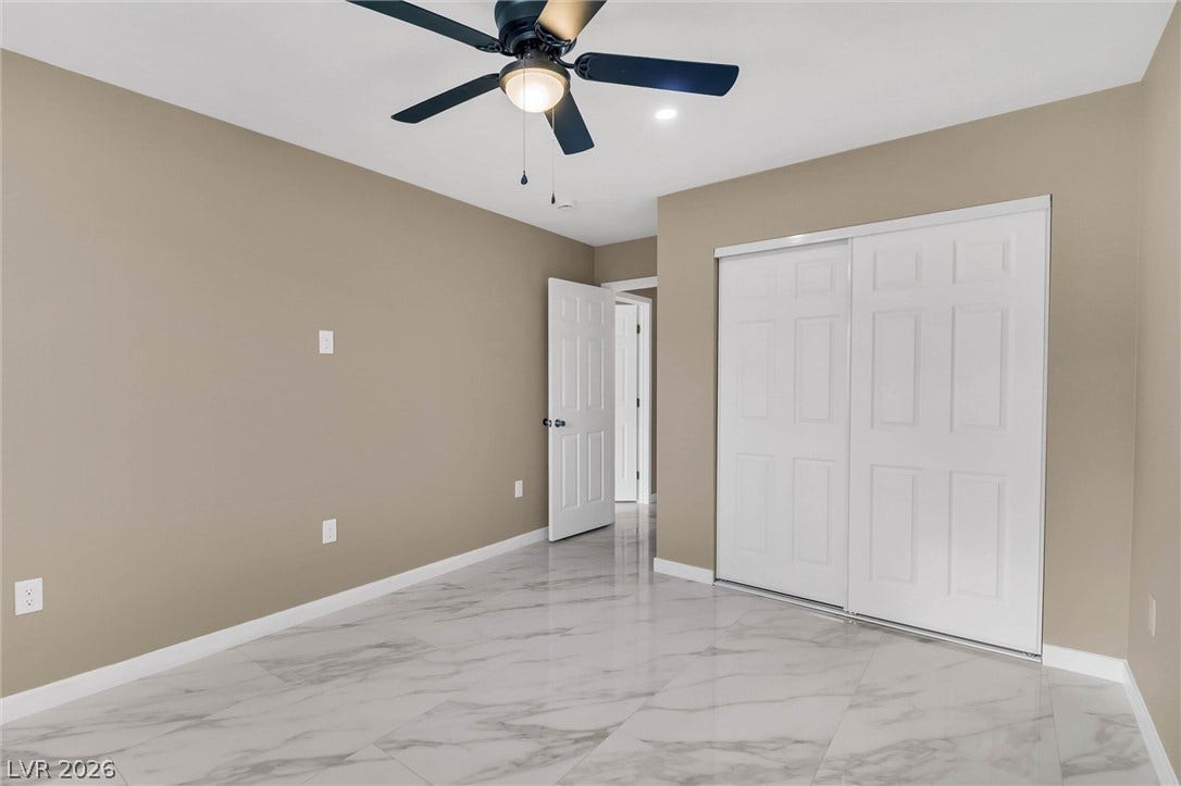 Polished tile flooring and clean lines define this comfortable, versatile space.