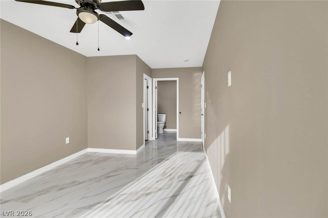 Polished tile flooring and clean lines define this versatile private space.