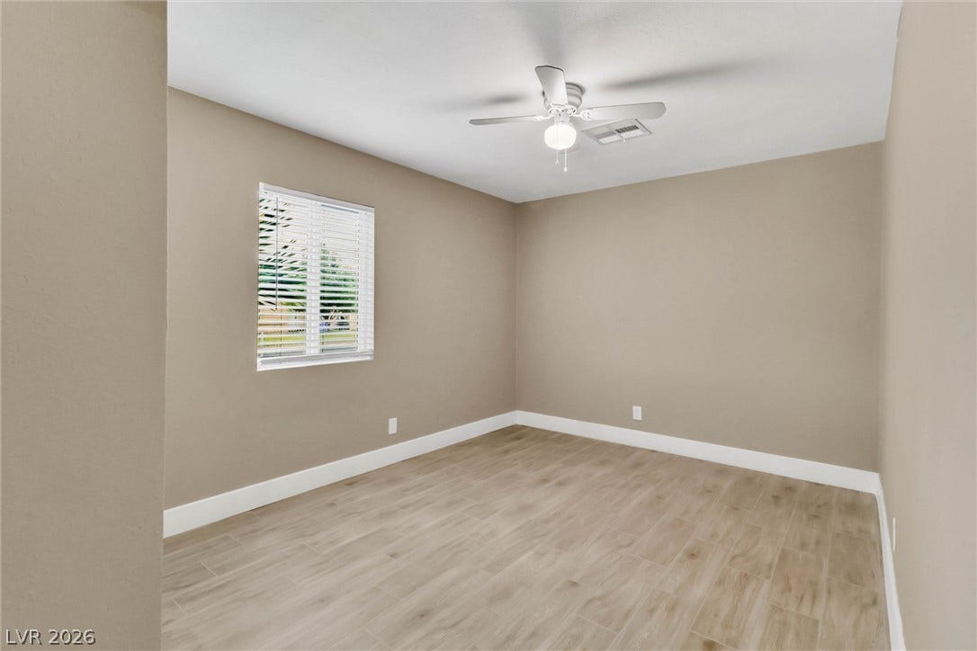 Crisp trimwork and durable tile flooring highlight this versatile interior space.