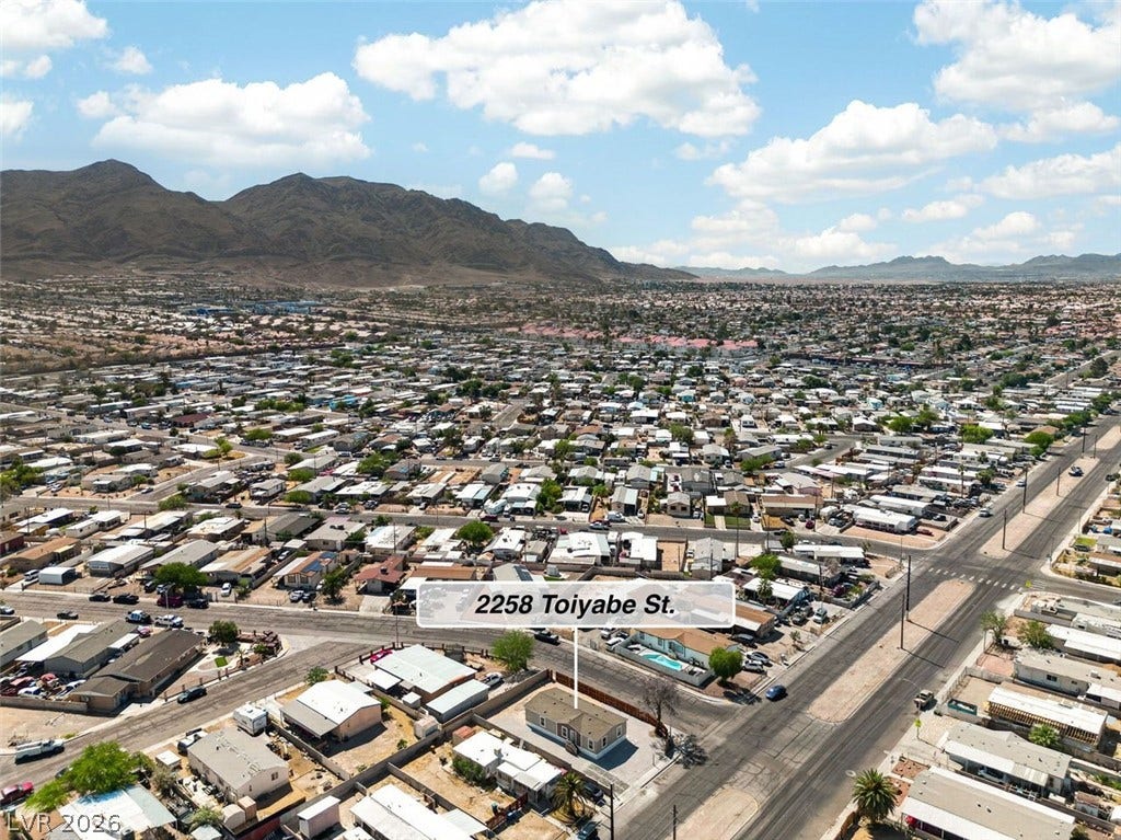 2258 Toiyabe Street, Las Vegas, NV 89156 Scenic mountain vistas frame this peaceful neighborhood backdrop under clear blue skies.
