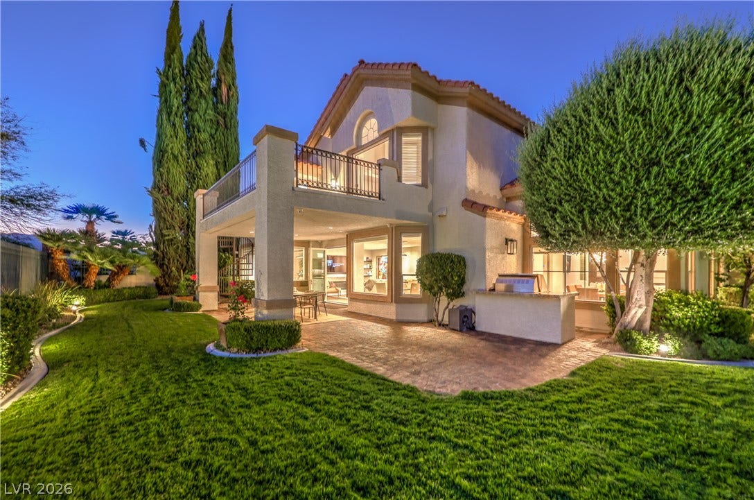 Large outdoor patio, built-in BBQ area and 120 feet of golf course frontage.  Large balcony of primary bedroom with amazing golf course views