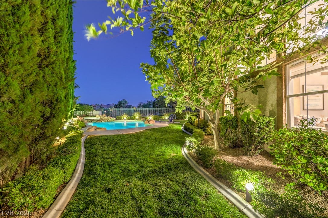 Large side yard for privacy and with fig tree and extra space to enjoy.