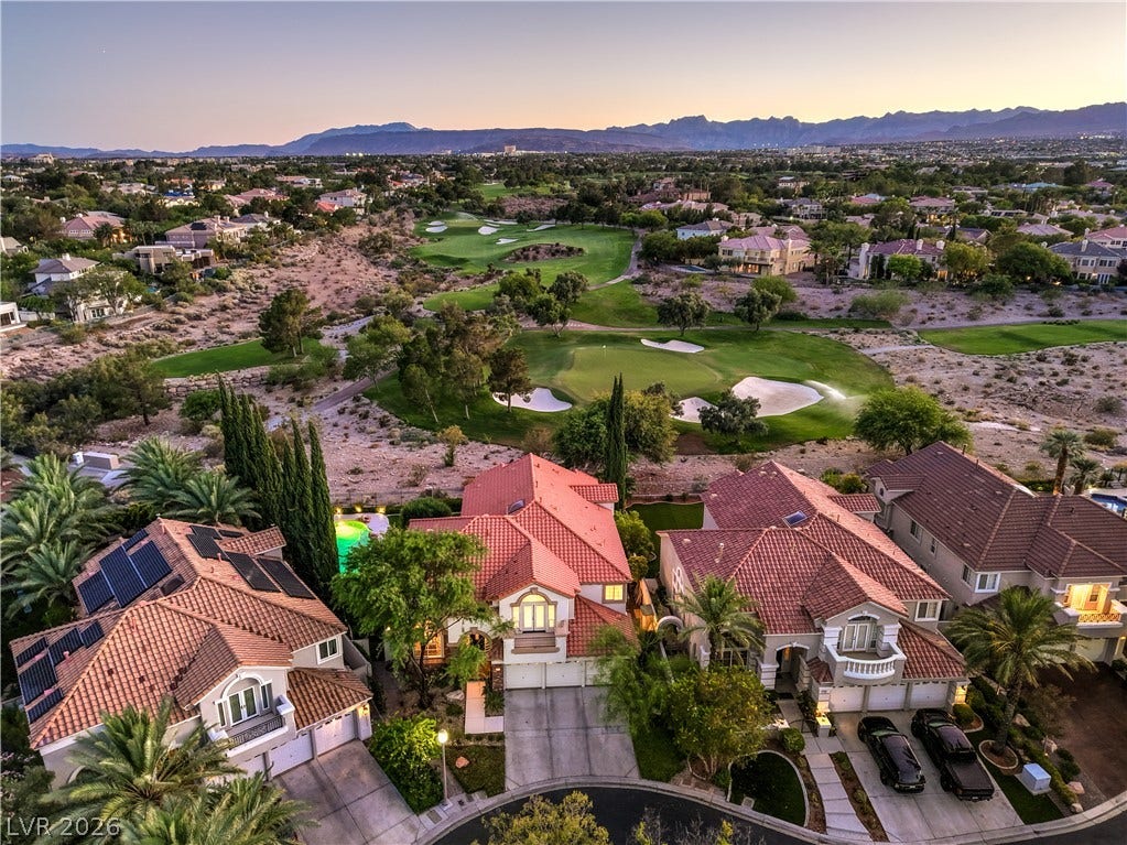 Ideally situated on a quiet cul-de-sac. With views of the Summerlin private TPC golf course this home is situated in an enclave of custom and semi-custom homes