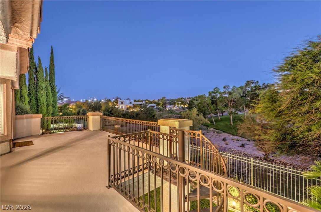 Balcony off primary bedroom and view of golf course