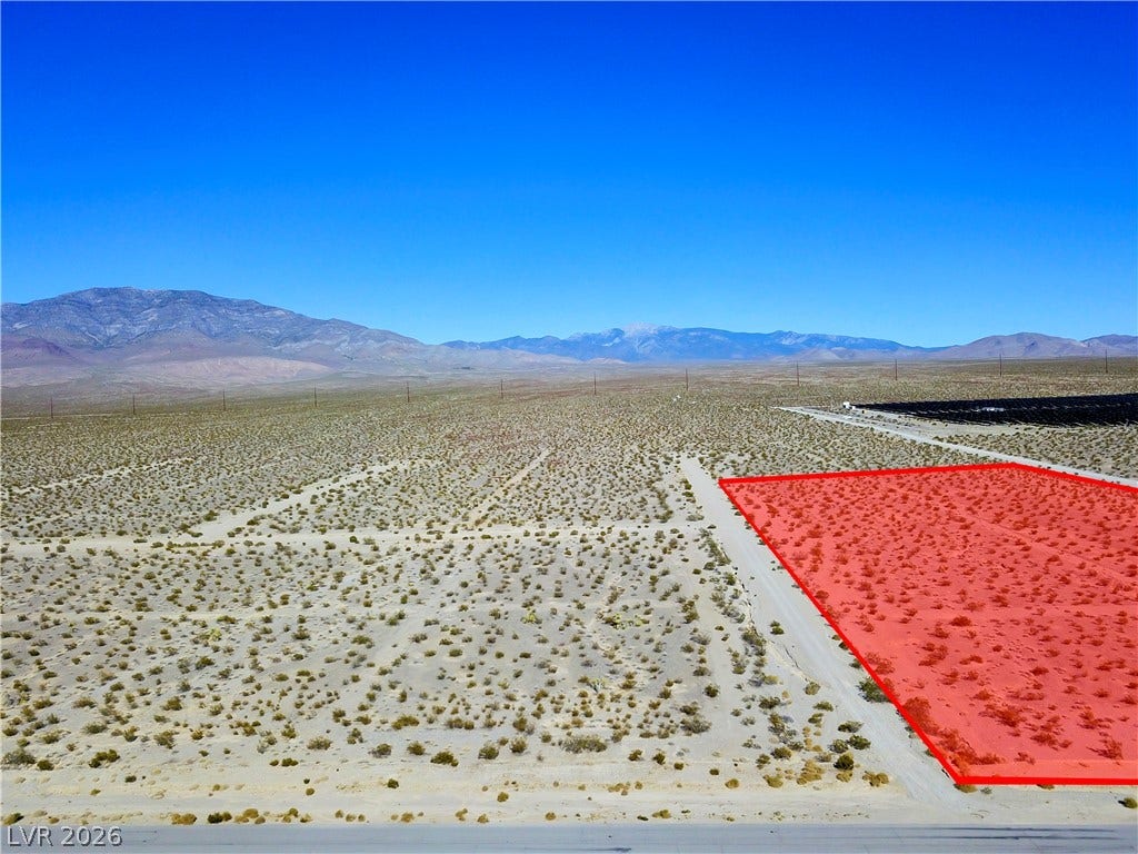 2180 E Simkins Road, Pahrump, NV 89060 Vast desert landscape offers sweeping mountain views and endless development potential.