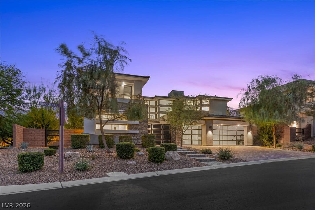 11453 Rhodolite Court, Las Vegas, NV 89135 Bold contemporary lines and refined stone accents define this modern exterior silhouette.