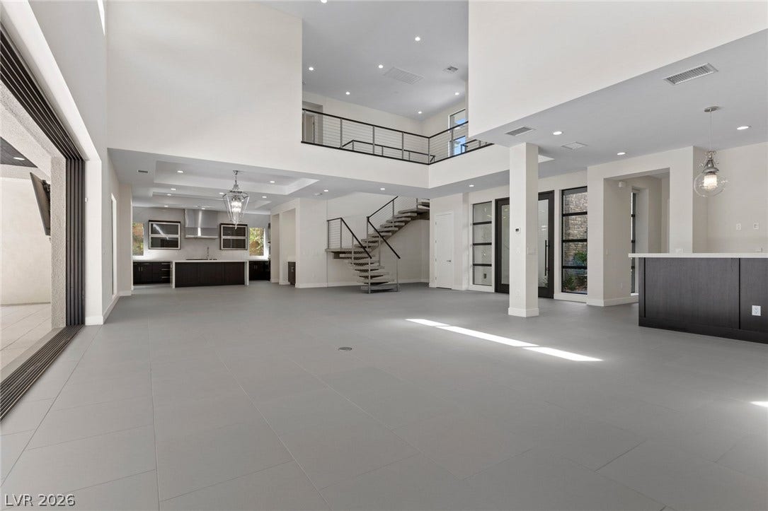 11453 Rhodolite Court, Las Vegas, NV 89135 Clean lines and soaring double-height ceilings define this open architectural layout.