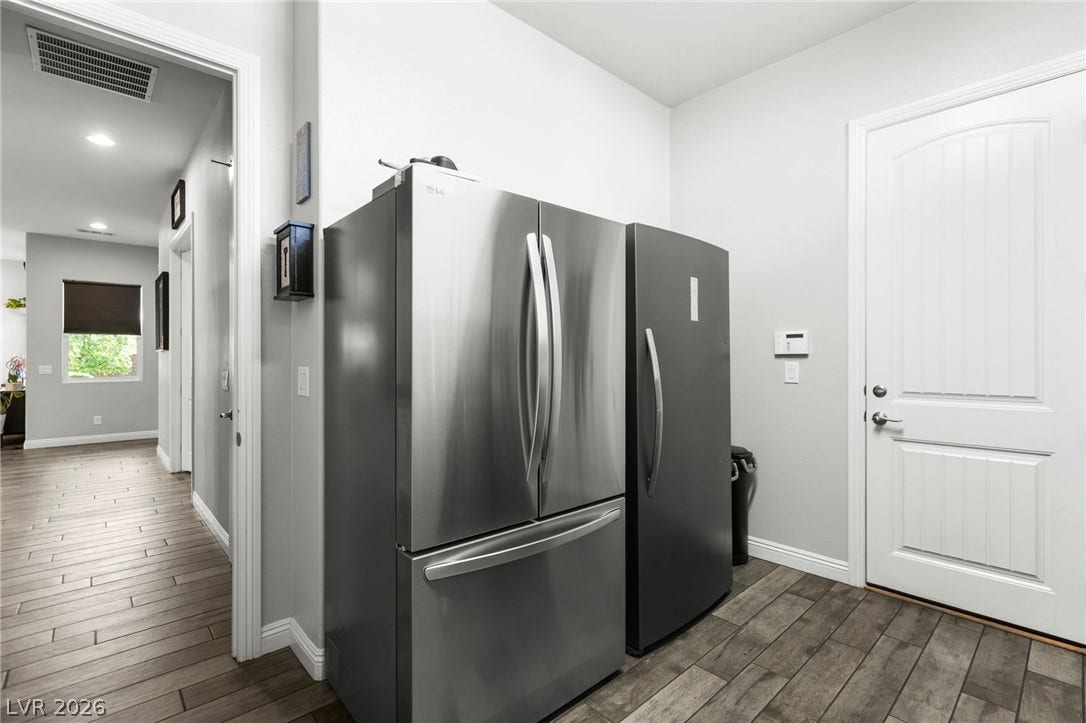 327 Castle Wynd Avenue, Las Vegas, NV 89183 Now that's a laundry room, large enough to fit TWO refrigerators!
