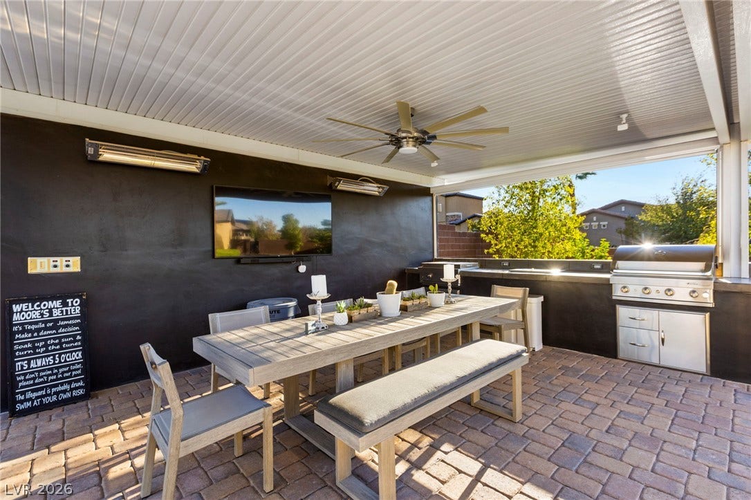 327 Castle Wynd Avenue, Las Vegas, NV 89183 outdoor kitchen with built in grills, commercial heaters, and surround sound