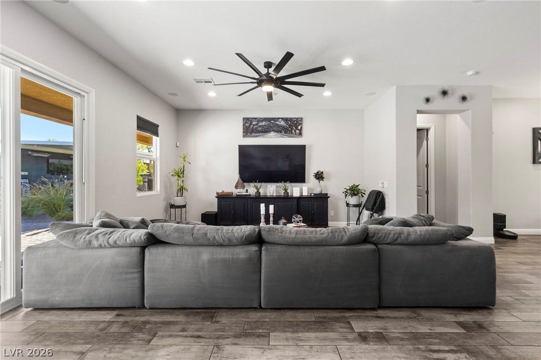 327 Castle Wynd Avenue, Las Vegas, NV 89183 surround sound in living room and it be customized to play throughout the outdoor speakers.