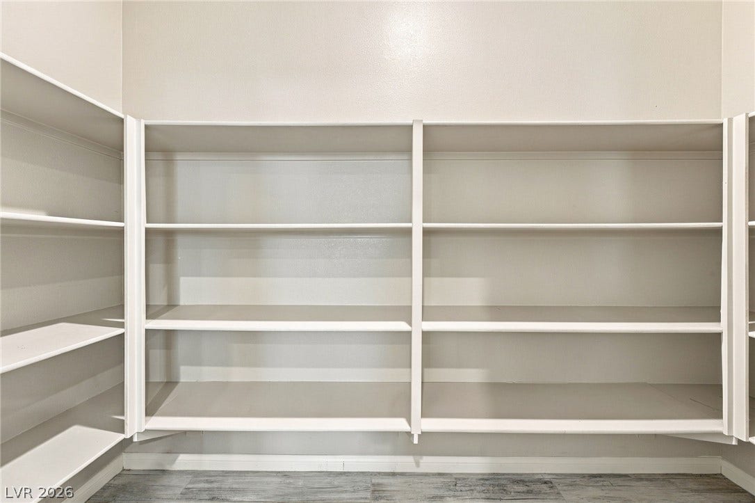 4216 Campriani Avenue, North Las Vegas, NV 89084 Generous built-in shelving provides abundant storage space in this walk-in pantry.