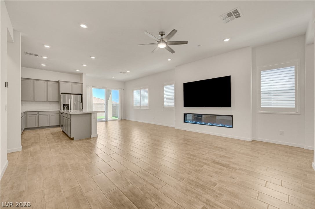 108 Barkset Way, Henderson, NV 89011 Living Room with Built In Electric Fireplace