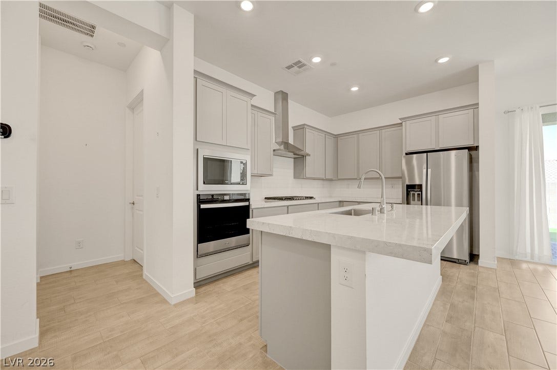 108 Barkset Way, Henderson, NV 89011 Kitchen with Island and Bar Dining Area