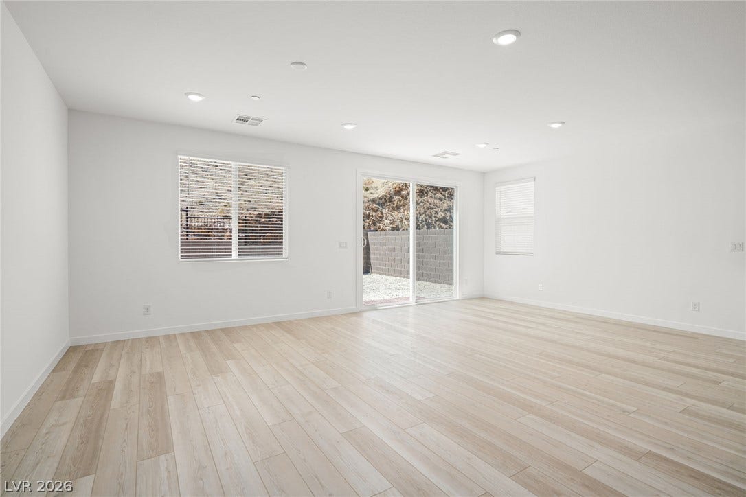1429 Bianca Falls Drive, Henderson, NV 89011 Clean lines and smooth flooring define this versatile interior space with sliding door yard access.