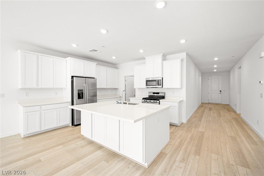 1429 Bianca Falls Drive, Henderson, NV 89011 Clean lines and a spacious center island define this modern culinary space.