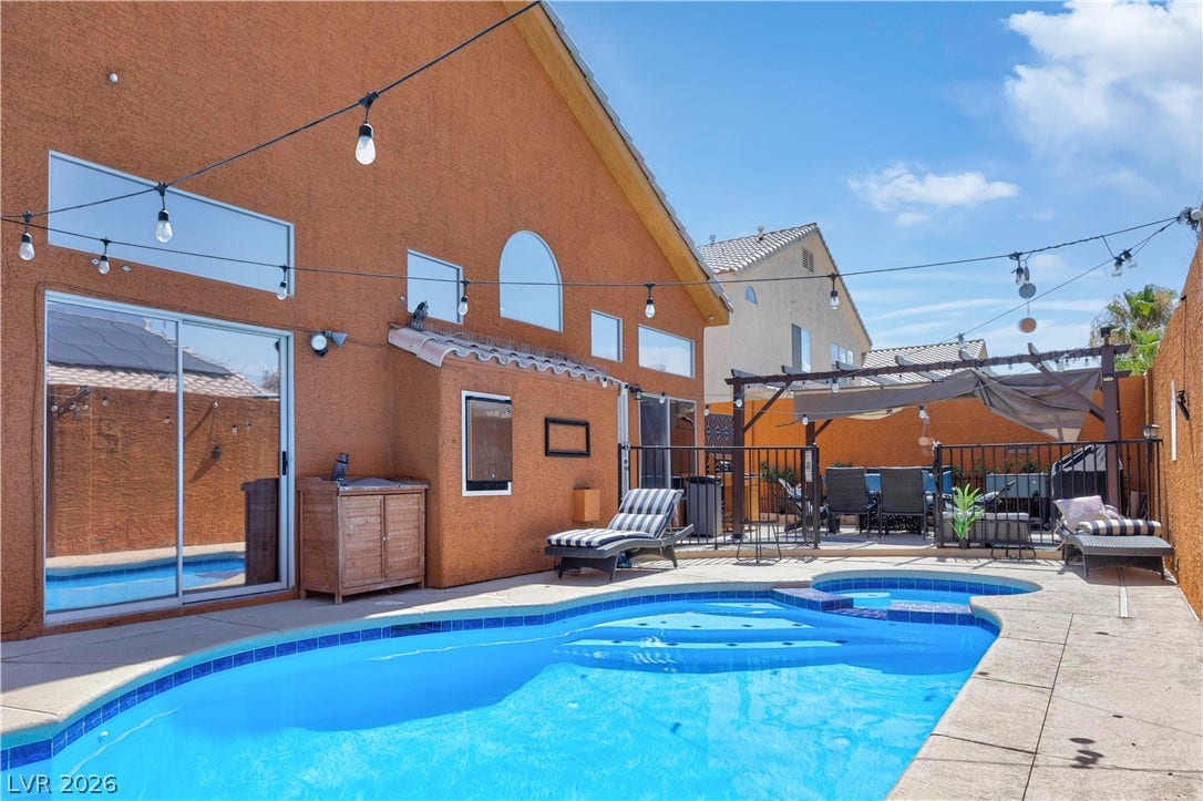 530 Rancho Del Mar Way, North Las Vegas, NV 89031 A sparkling in-ground pool serves as the centerpiece of this private, sun-drenched backyard retreat.