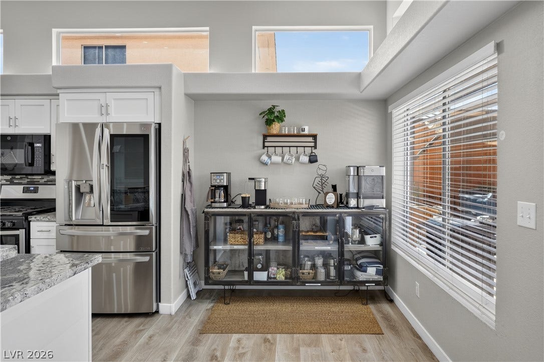 530 Rancho Del Mar Way, North Las Vegas, NV 89031 High ceilings and clerestory windows bring abundant natural light into this modern kitchen space.