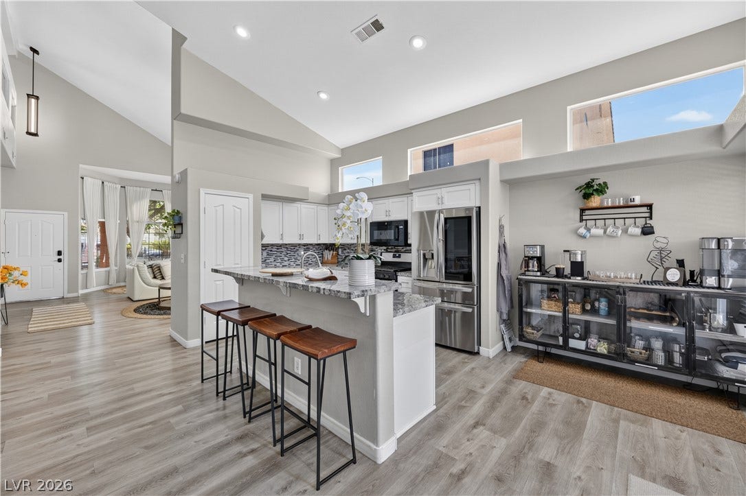 530 Rancho Del Mar Way, North Las Vegas, NV 89031 Angled ceilings and high clerestory windows bring architectural character and natural light into this kitchen.
