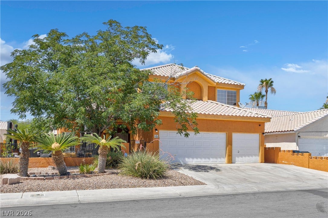 530 Rancho Del Mar Way, North Las Vegas, NV 89031 Spanish tile roofing and a spacious multi-car garage define this desert-landscaped residence.