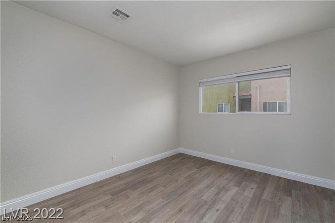 1814 N Decatur Boulevard, #202, Las Vegas, NV 89108 Smooth wood-style flooring and simple trimwork define this versatile secondary space.