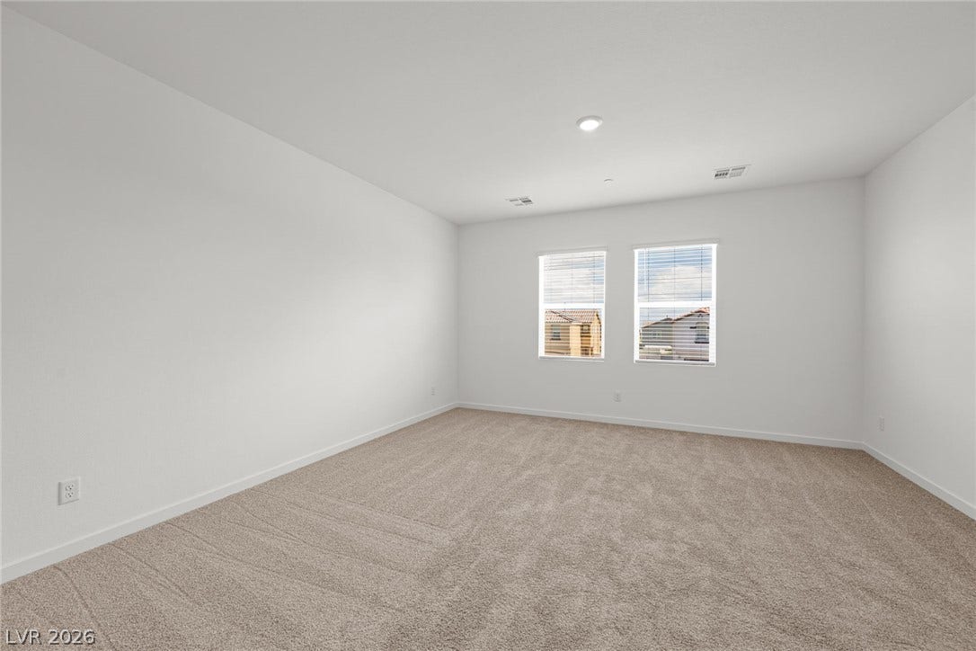 8142 Gusty Brook Street, Las Vegas, NV 89113 Plush carpeting and natural light define this versatile upper-level room.