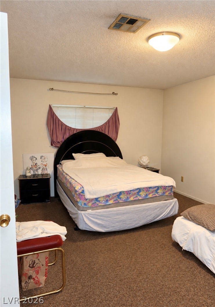101 Luna Way, #242, Las Vegas, NV 89145 Carpeted floors and neutral walls anchor this comfortable private retreat.