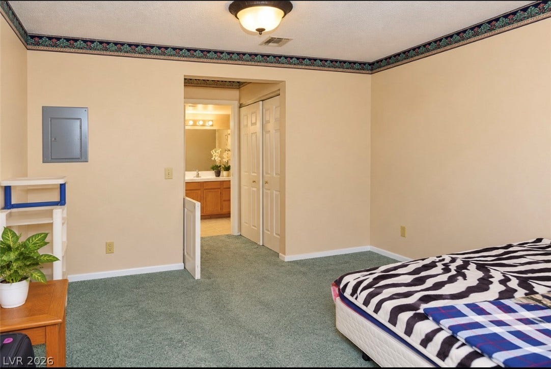 101 Luna Way, #242, Las Vegas, NV 89145 Plush carpeting anchors this bedroom suite complete with an attached private bath.